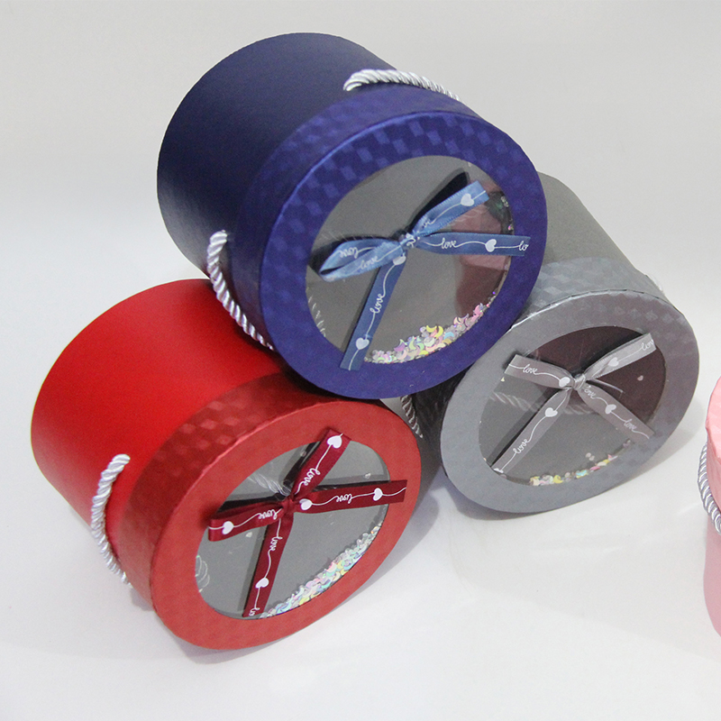 Coffret cadeau de bonbons rond transparent à fenêtre 80101 décoré d'un nœud en ruban